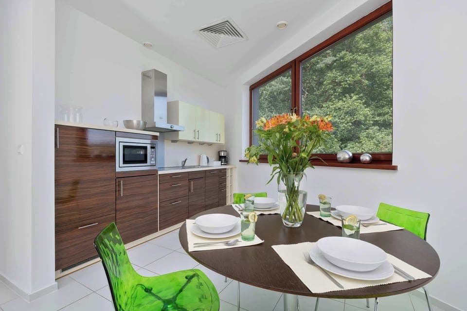 Bright dining nook by the window – perfect for morning coffee.

