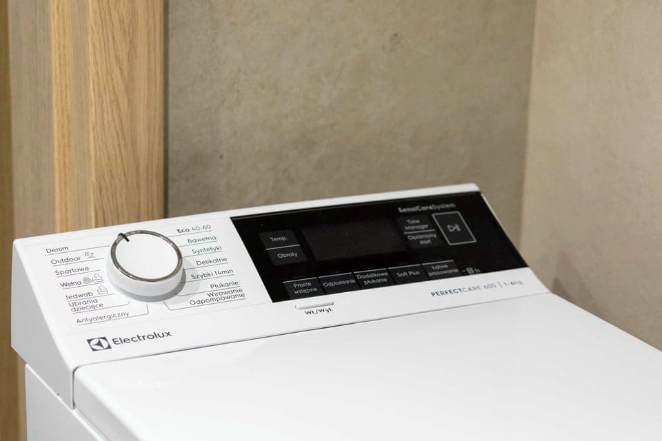 Washing machine in the bathroom.