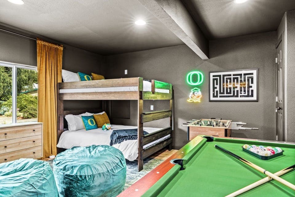 Ducks themed game room & 4th bedroom. Pool table, foosball, arcade, 65" TV