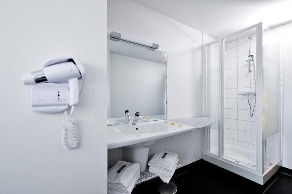 Hair dryer, towels, soap, shampoo