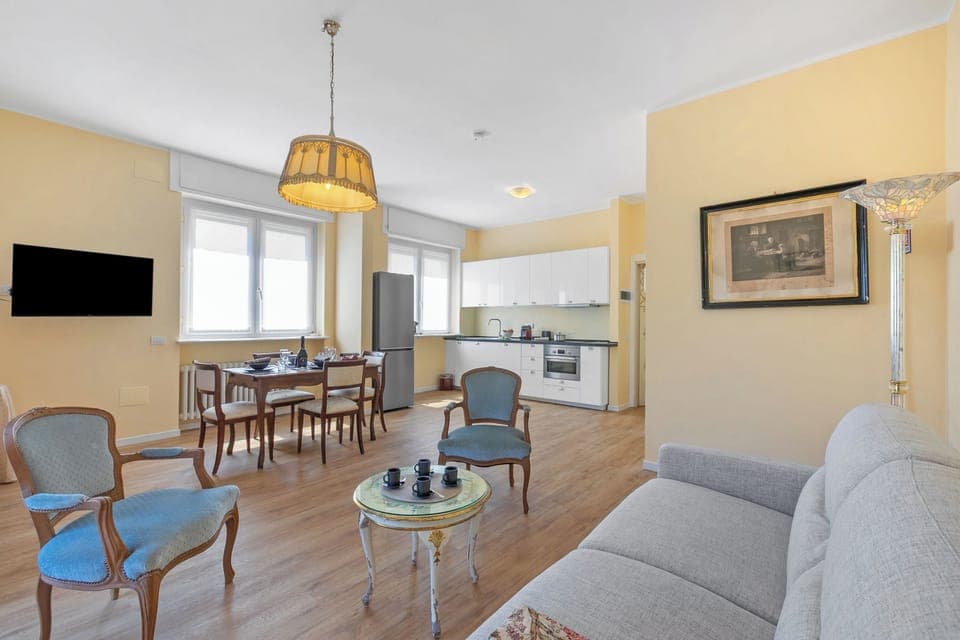 Family Apartment, Multiple Bedrooms (Strixia Apartment Stresa 50m From) | Living area | 21-inch flat-screen TV with cable channels
