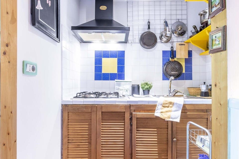 Kitchen, Major Appliance, Kitchen Appliance, Wood, Flooring, Furniture, Interior Design, Countertop, Floor, Cabinetry