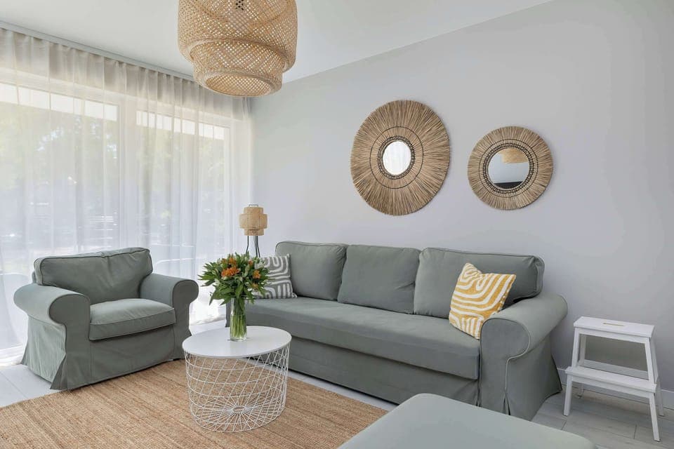 Living room with a comfortable sofa and TV.