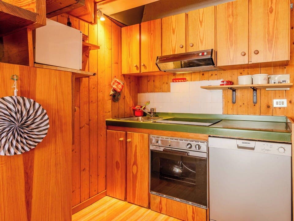 Wood, Flooring, Interior Design, Floor, Wood Stain, Ceiling, Room, Orange, Hardwood, Kitchen