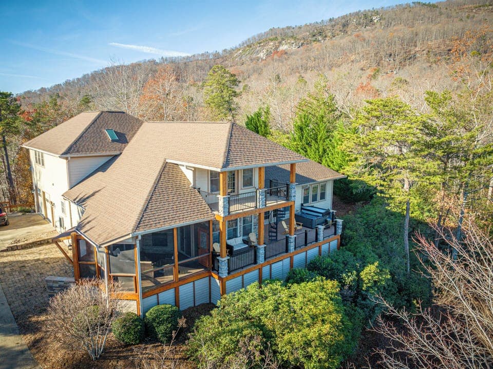 Welcome to Starry Ridge, a beautiful 4800 square foot home in the Rumbling Bald On Lake Lure community.