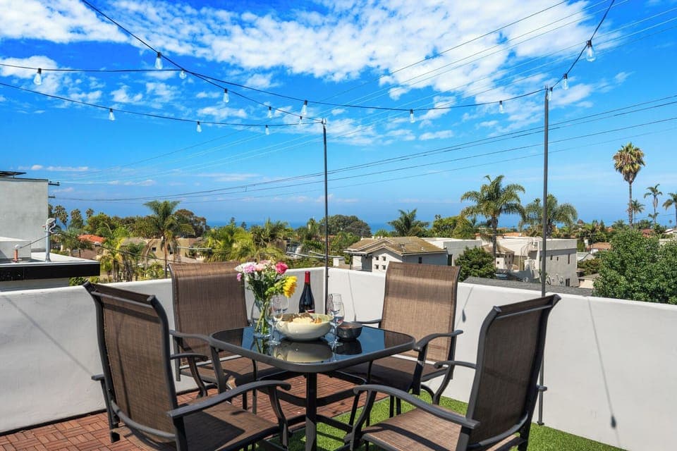 Welcome To Seaside Spiral!  Rooftop Deck Accessed by the Two Story Spiral Staircase.