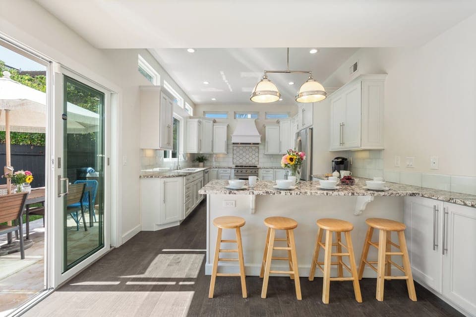 Large Well-Equipped Kitchen With Access To Backyard and Bar-B-Q.