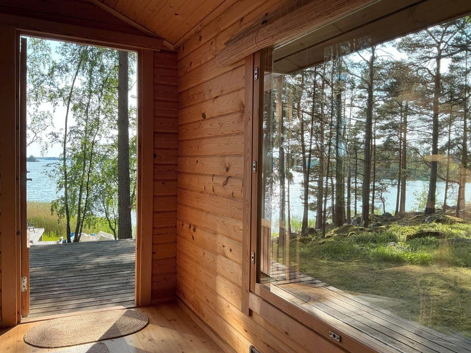 Sauna house sitting/dressing room with sea views