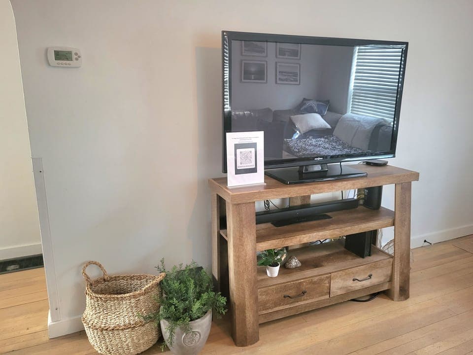 Smart TV in living room (and another in upstairs bedroom)