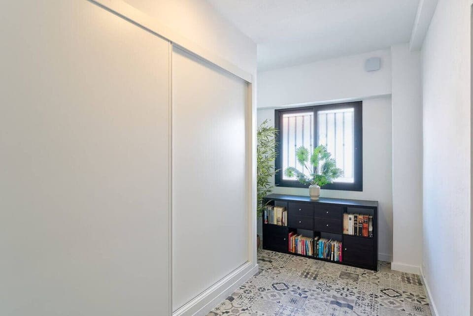 Laundry area, which is common to the three apartments in the building, and our free library which allows you to read during your stay with us.