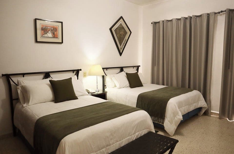 Standard Double Room, Courtyard View | In-room safe, laptop workspace, blackout drapes, free WiFi