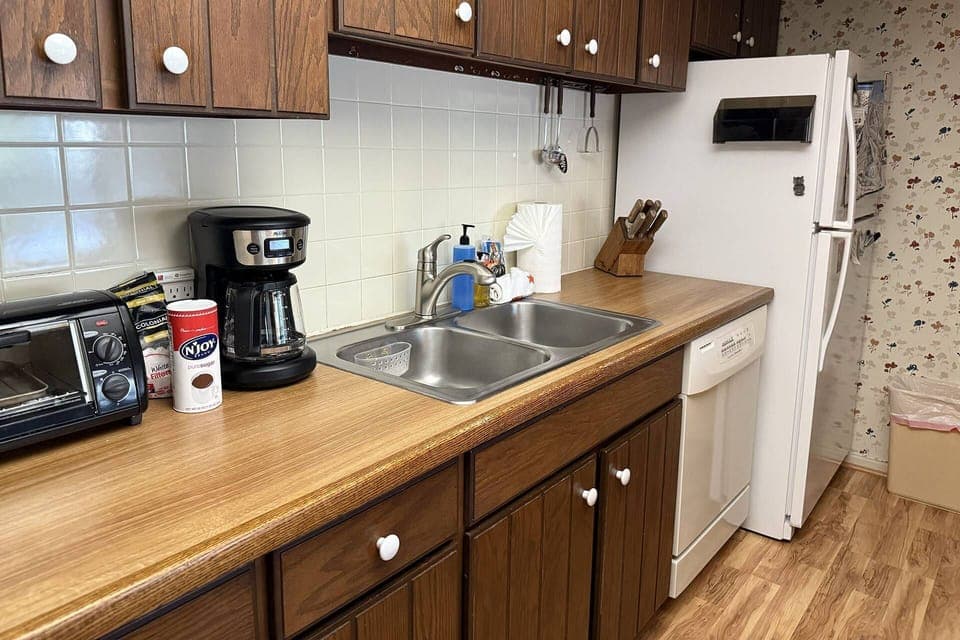 Our kitchen features ample cabinetry and all the essentials for a gourmet vacation meal.