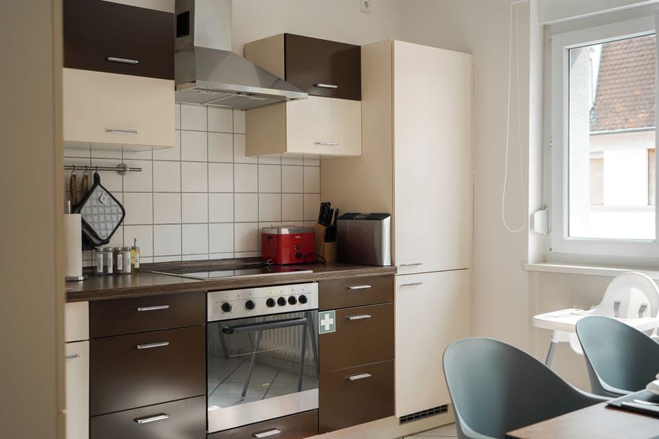Superior Apartment | Private kitchen | Electric kettle, toaster, highchair