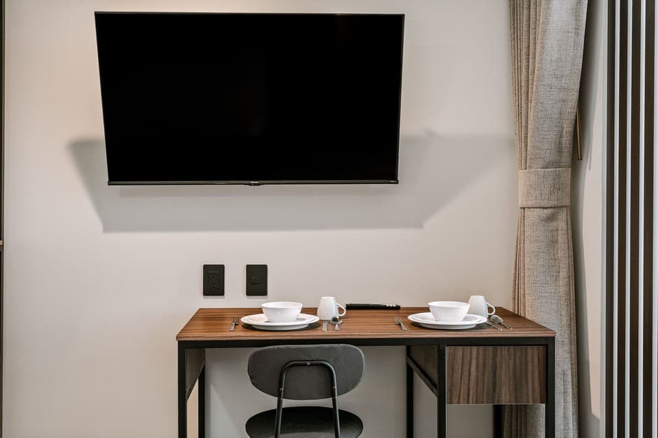 Comfort Apartment, City View | Desk, laptop workspace, iron/ironing board, free WiFi