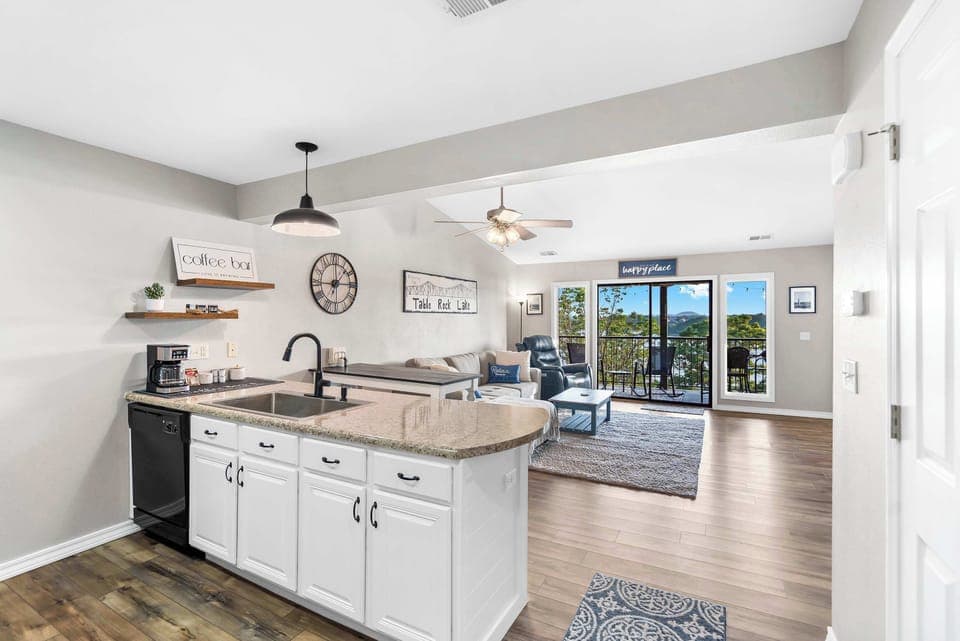 The open kitchen offers ample space & every home comfort