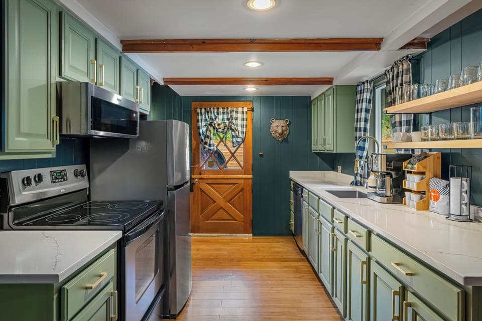 [The Chalet] This galley-style kitchen is stocked with cooking essentials.
