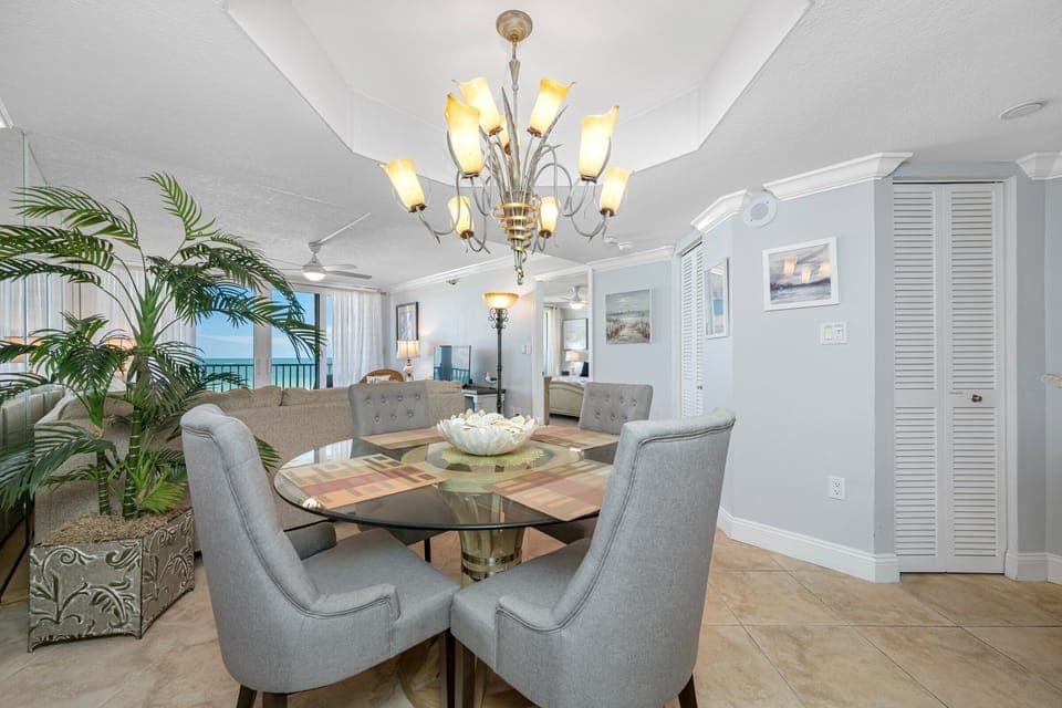 Comfortable seating under a modern chandelier.