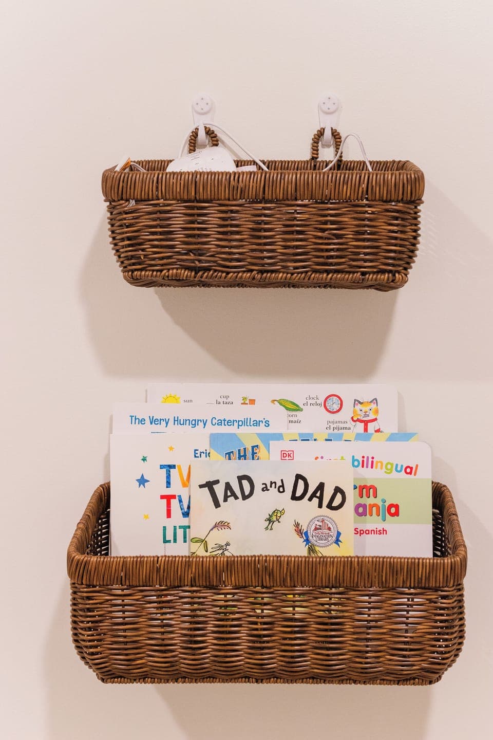 Books, sound machine, & baby monitor available for parents of little ones.