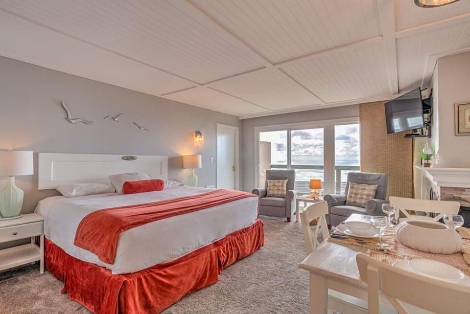 Experience the serene ambiance of this King Bed Studio, featuring a comfortable king bed and picturesque ocean views, perfect for a cozy resort-style getaway.