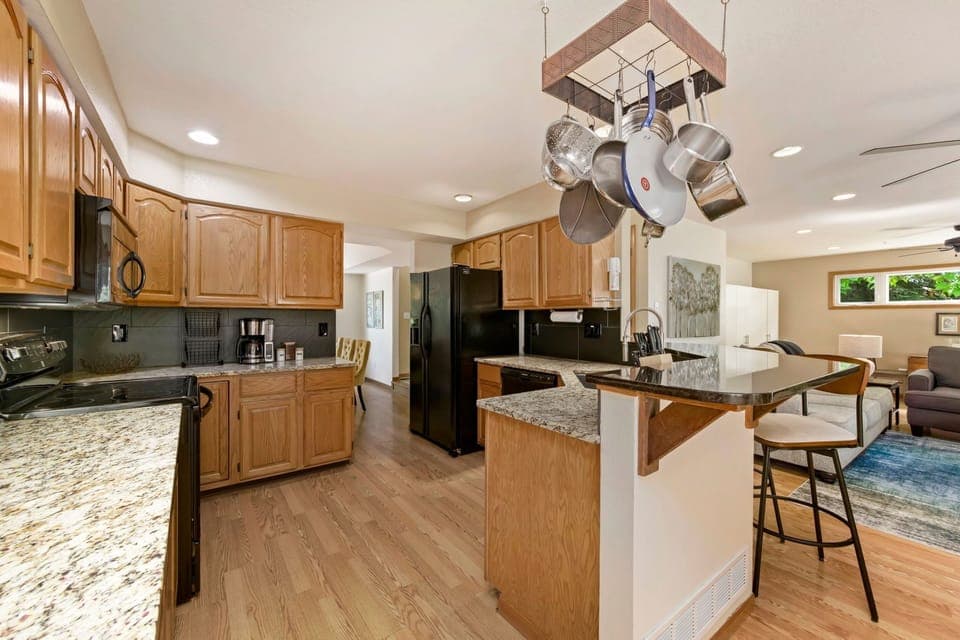 House, Multiple Beds, Patio, Garden View (2765 27th CT SW) | Private kitchen | Fridge, microwave, oven, stovetop