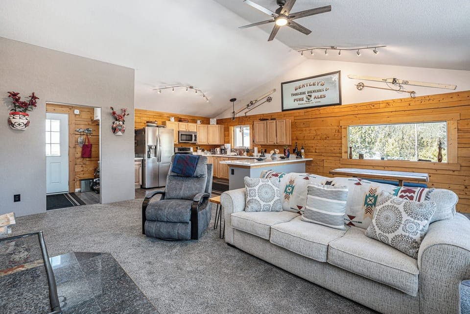 The cozy sectional beckons you to sink in, while a beautiful coffee table serves as the perfect gathering spot for family, friends, or a quiet moment to yourself. 