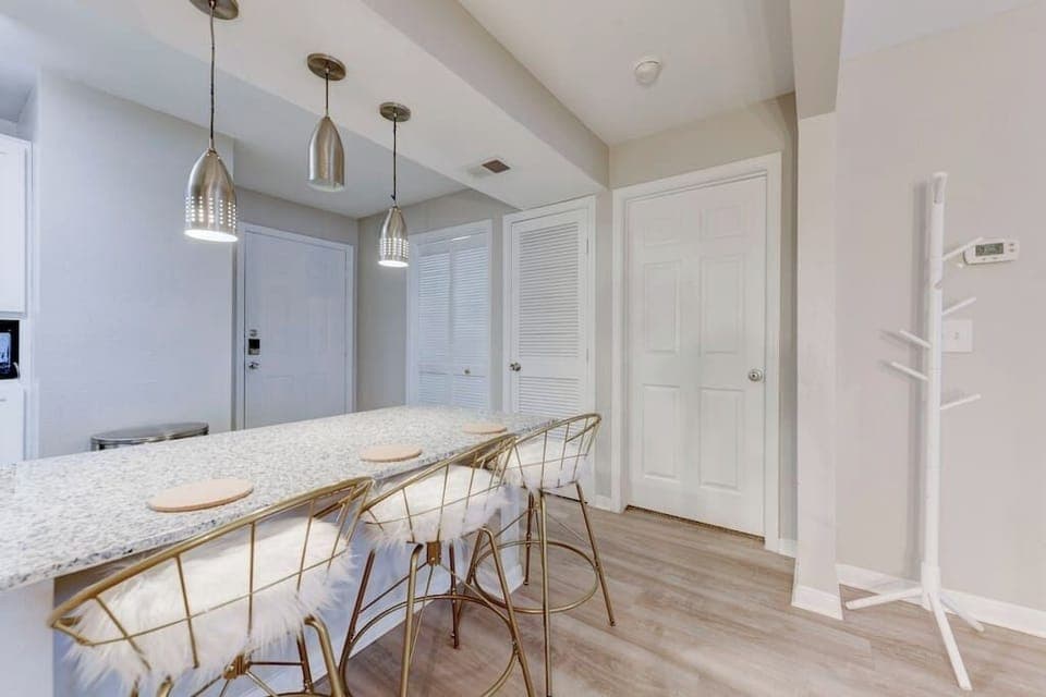 Bright kitchen w/ ample counter space and a functional layout for easy cooking.