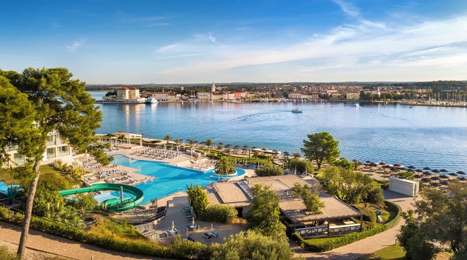 Indoor pool, outdoor pool, pool umbrellas, sun loungers