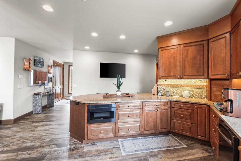 Microwave below, with a fully wheelchair-accessible kitchen.