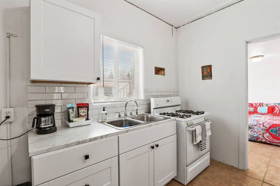 Kitchen Cabinets/Sink/Coffee maker/stove