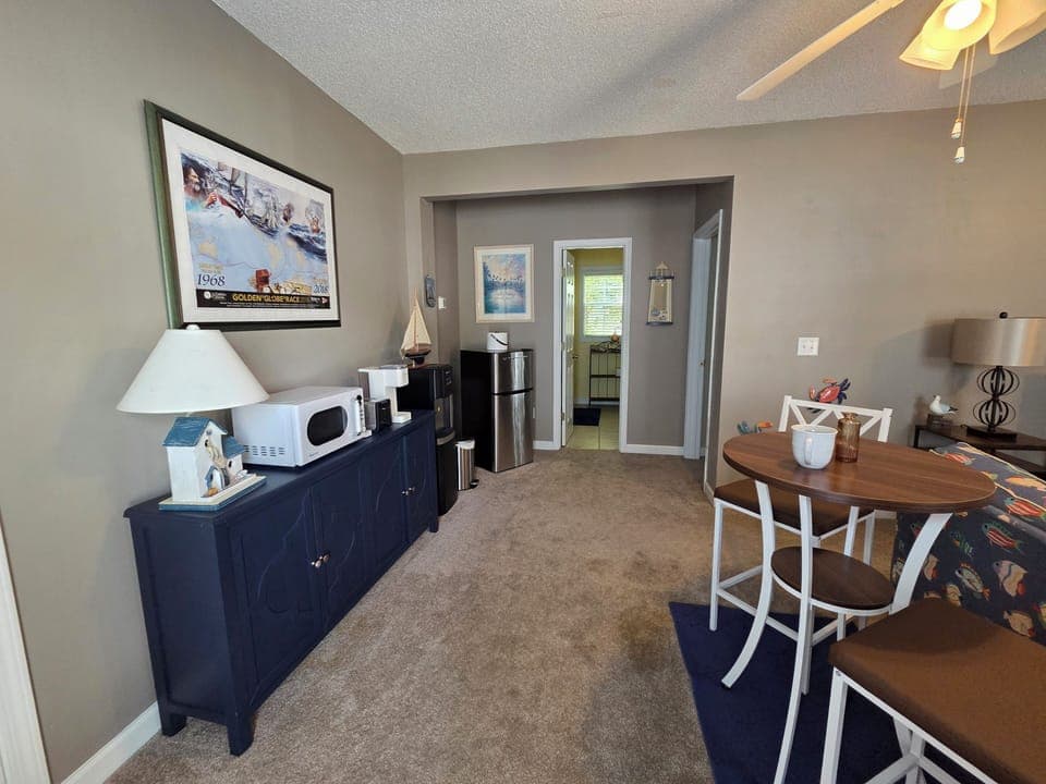 Entry into "kitchenette" area with bathroom and bedroom at far end