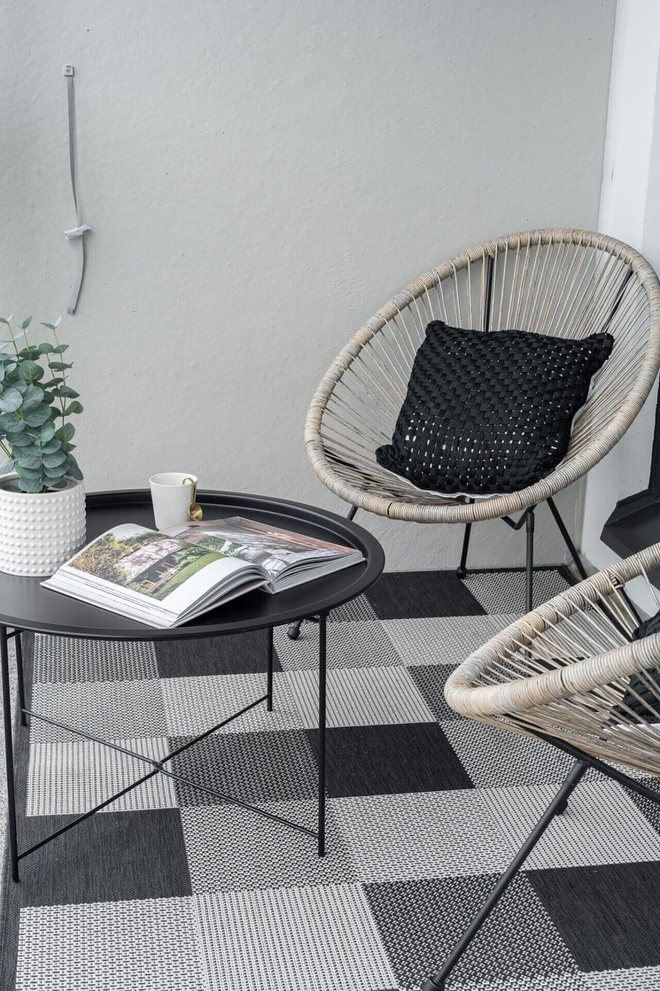 Sheltered balcony lounge—the perfect spot to unwind and take in the fresh city air.