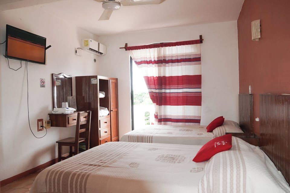 Deluxe Quadruple Room, Balcony, City View | Free WiFi