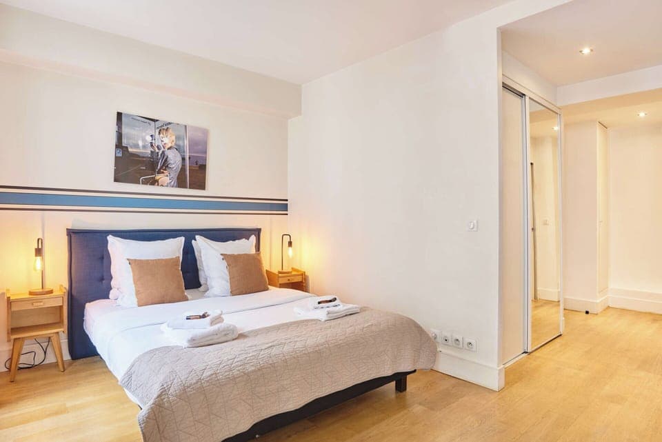 Apartment | Laptop workspace, iron/ironing board, bed sheets