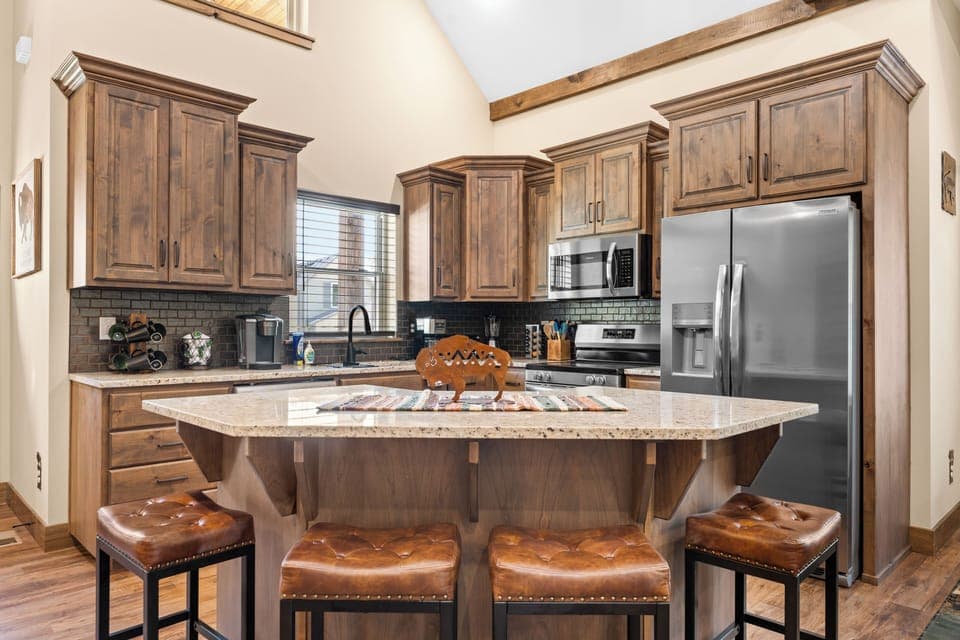 Stocked kitchen and sit up bar