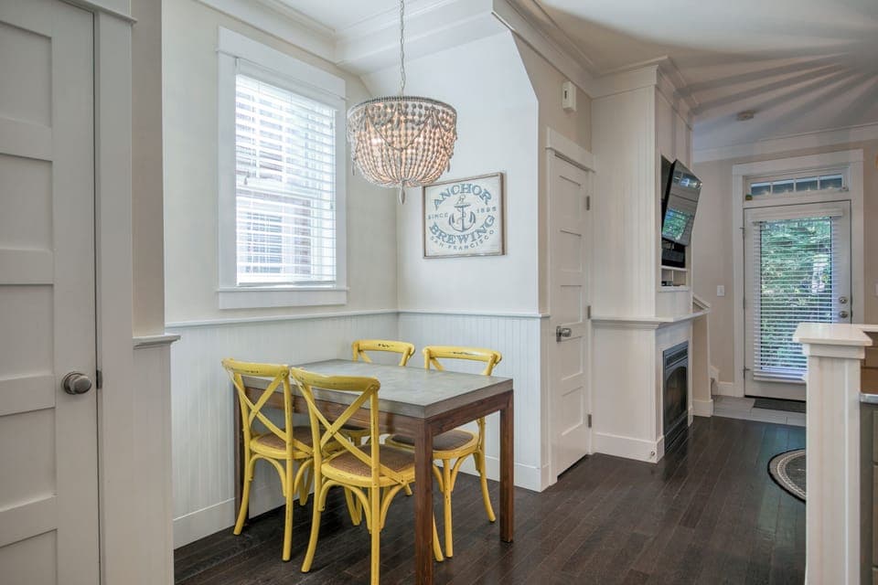 The dining room table with seating for four. 
