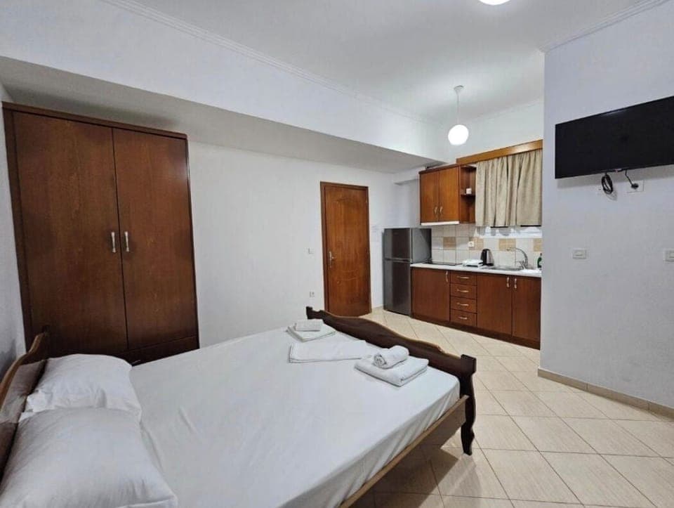 Economy Studio, Balcony, Garden View | Iron/ironing board, free WiFi