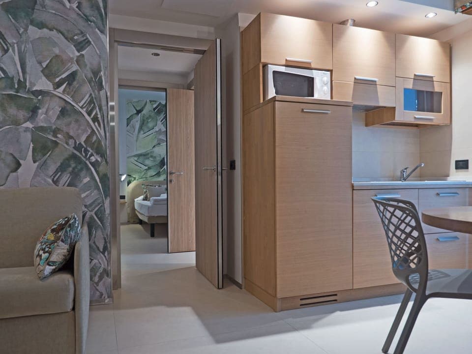 Deluxe Condo, 2 Bedrooms | Private kitchen | Fridge, microwave, stovetop, dishwasher