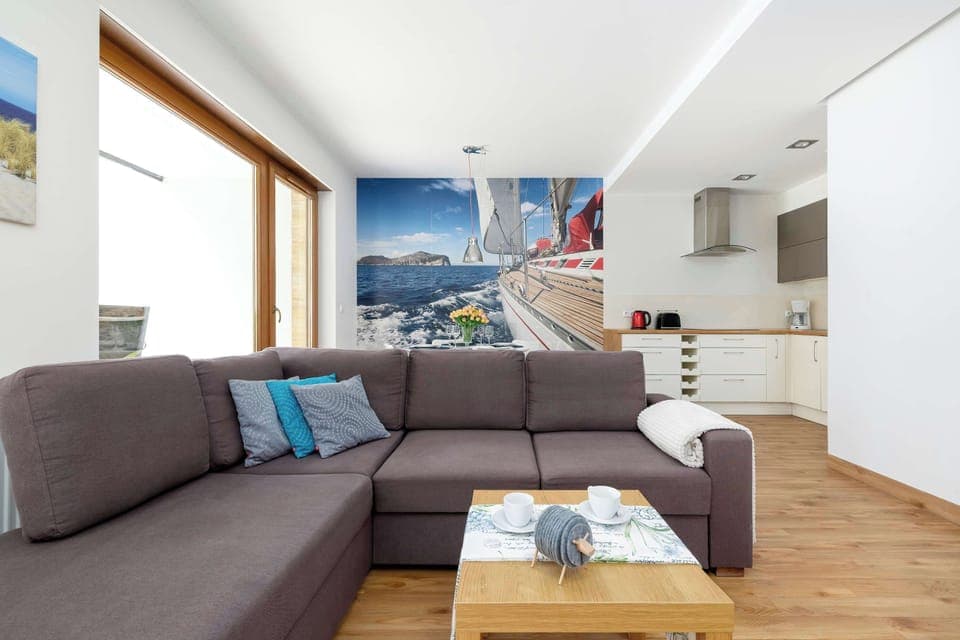 Living room with a comfortable sofa and TV. 