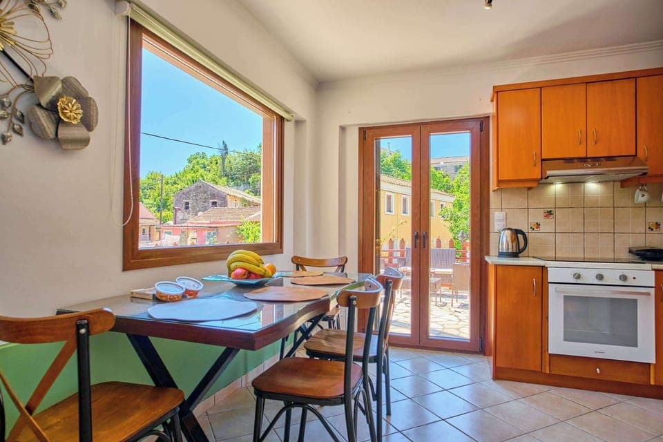 Cozy dining nook with garden views, perfect for enjoying home-cooked meals