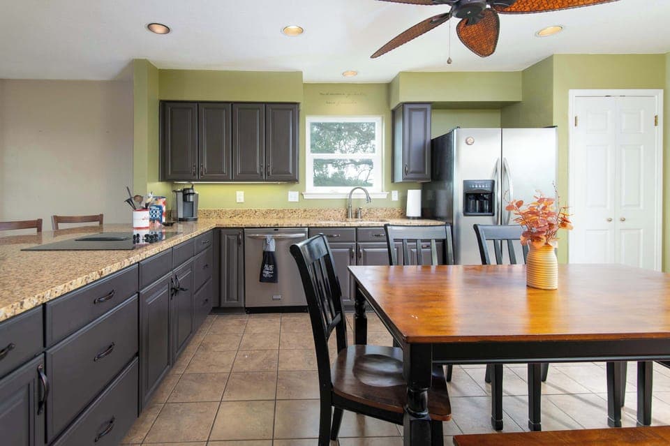 Enjoy a well-equipped cooking space with plenty of room to prep, cook, and share meals together.