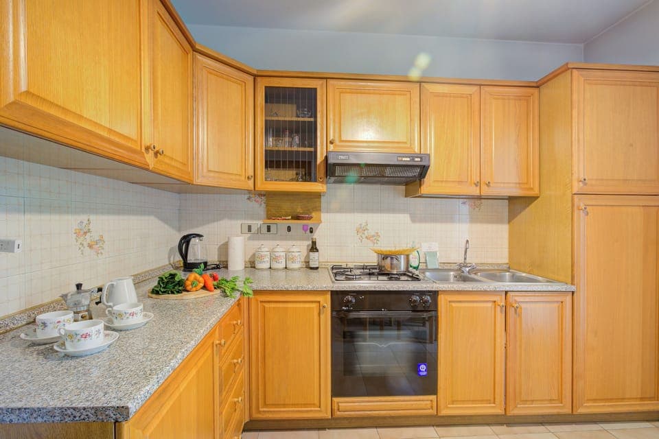Family Apartment, Multiple Bedrooms, 2 Bathrooms (Lake Garda Home) | Private kitchen | Fridge, oven, stovetop, coffee/tea maker