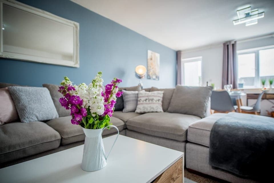 Snuggle on the large comfy sofa and rest those feet after a long day exploring