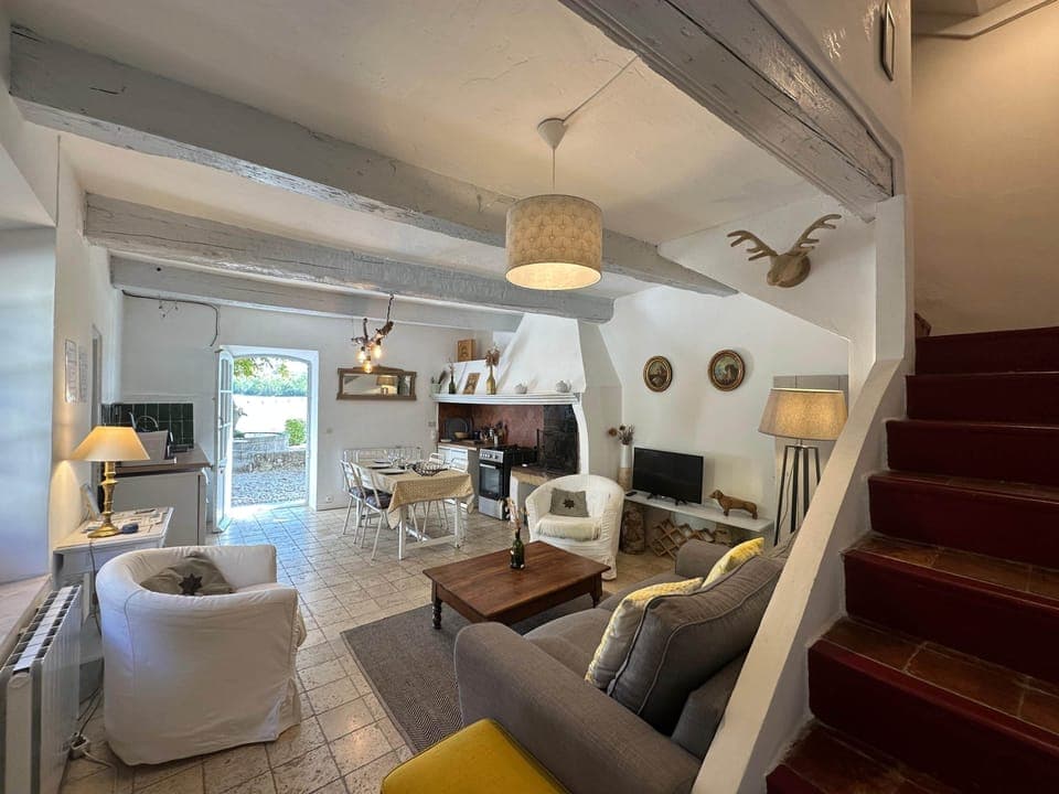 dining area, kitchen, table, living room, sofa, oven, TV