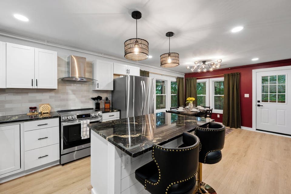 Sleek, modern kitchen with barstool seating.