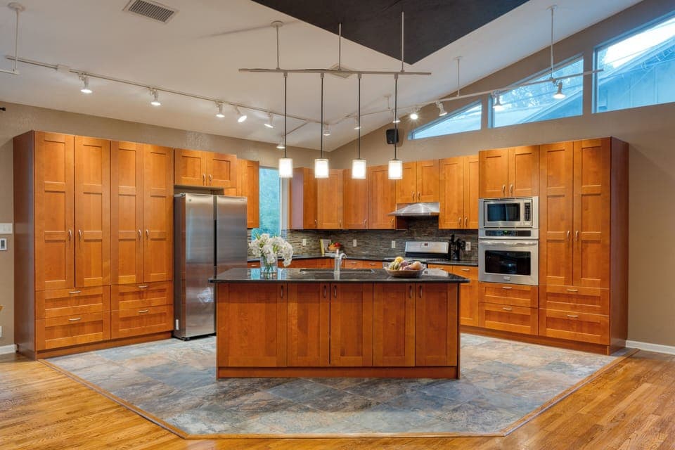 Sleek, modern kitchen with stainless steel appliances.