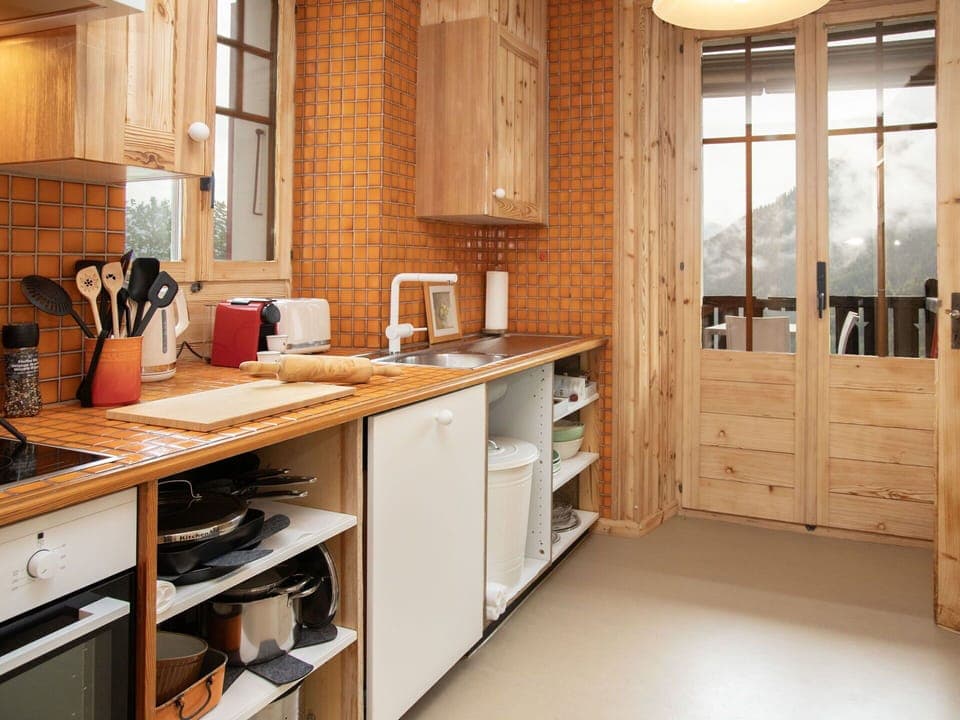 Kitchen, Furniture, Countertop, Cabinetry, Wood, Interior Design, Kitchen Appliance, Flooring, Cupboard, Major Appliance