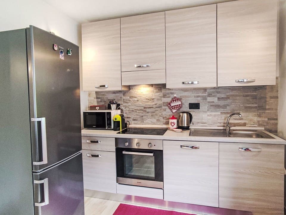 Kitchen Appliance, Kitchen, Countertop, Cabinetry, Major Appliance, Furniture, Home Appliance, Flooring, Wood, Interior Design