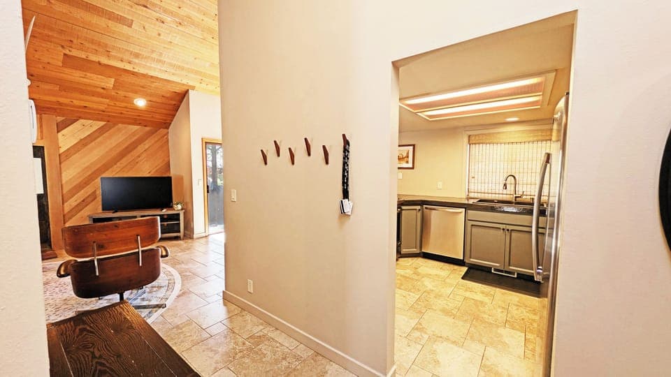 Off to the left is a loop of the Kitchen, Dining and Living areas