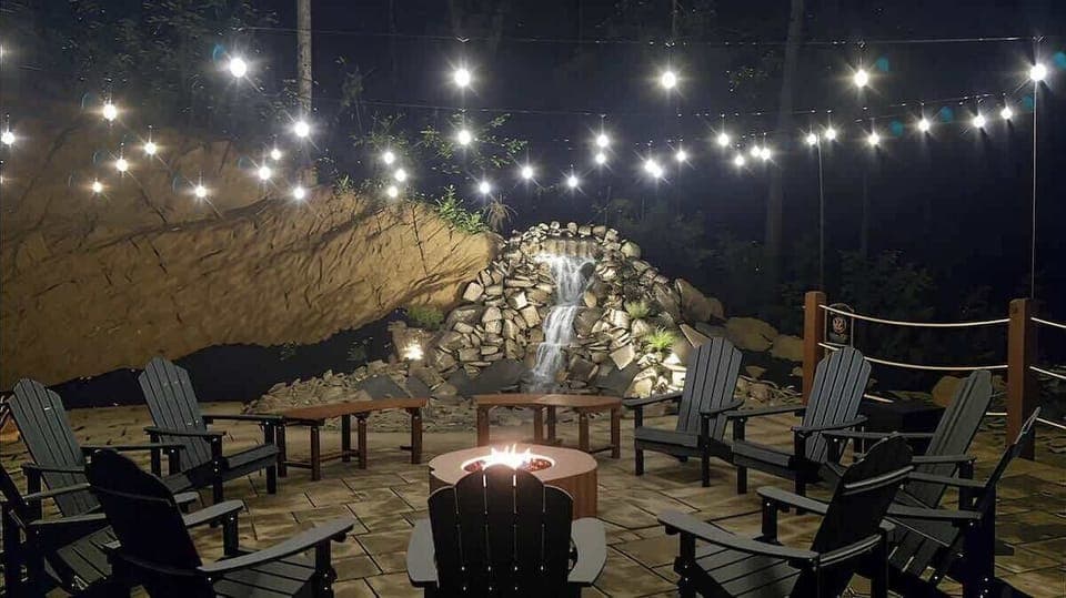 Make memories together around the warm fire while watching the relaxing waterfall. Overhead lights complete the warm ambience and extend the evenings.