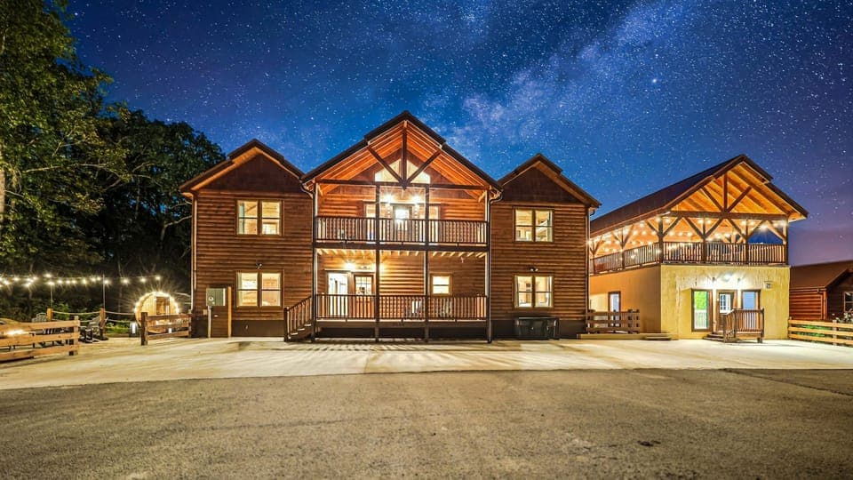 Game Time Retreat is a large, luxurious cabin that is 5,800 square feet and has Waterfall, Firepit, an EPIC Game Room, Indoor Pool, Outdoor Theater, Spa, Sauna and more!
